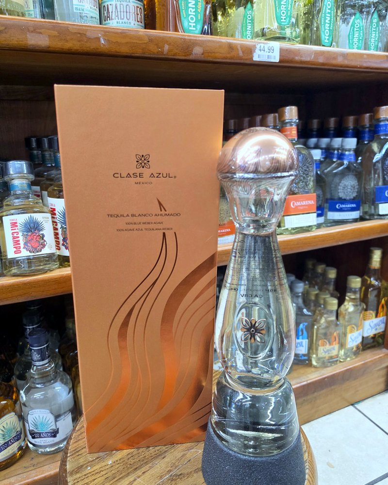 A Clase Azul tequila bottle displayed on the shelf