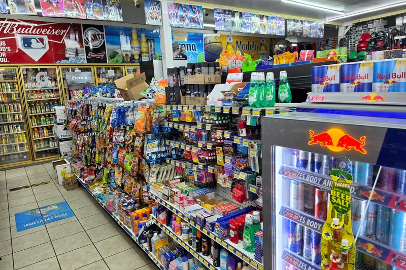 The run of cold doors, stocked with sodas, water and energy drinks
