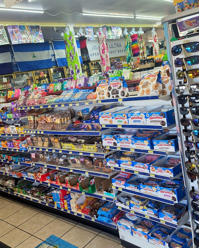 Candy end-cap and grab-and-go shelves near the counter