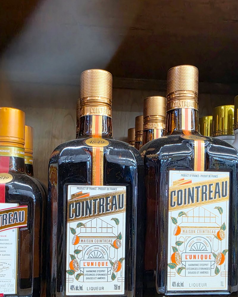 Newly arrived bottles on the liqueur shelf