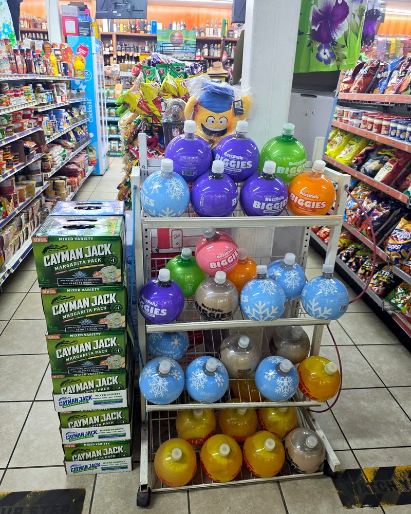 Party supplies and mixers stacked by the drinks aisle